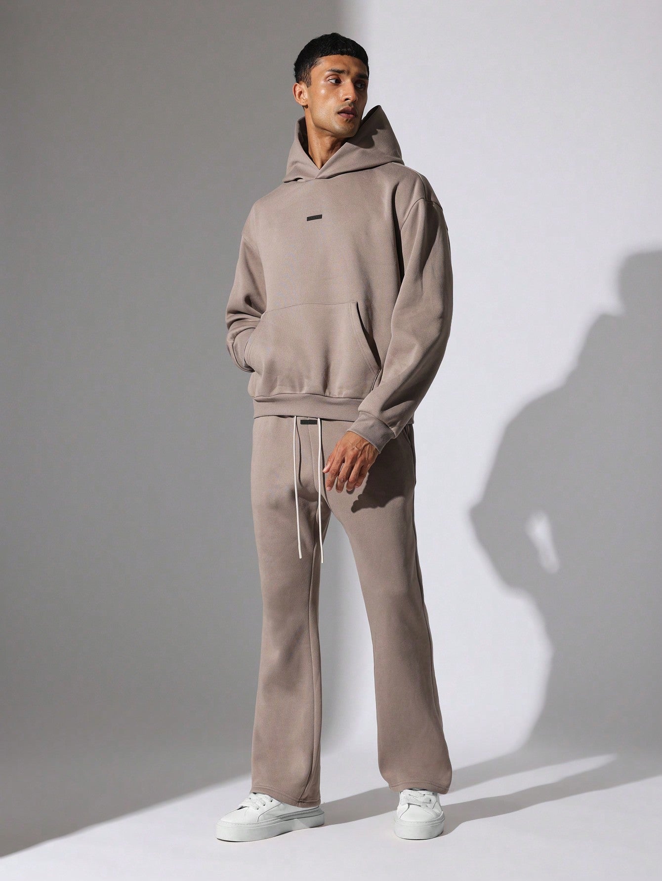 Regular Fit Overhead Hoodie And Flare Fit Sweatpants With Silicon Badge & Drawstrings 2 Piece Set