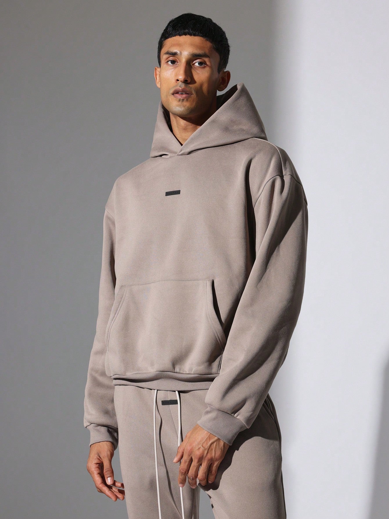 Regular Fit Overhead Hoodie And Flare Fit Sweatpants With Silicon Badge & Drawstrings 2 Piece Set