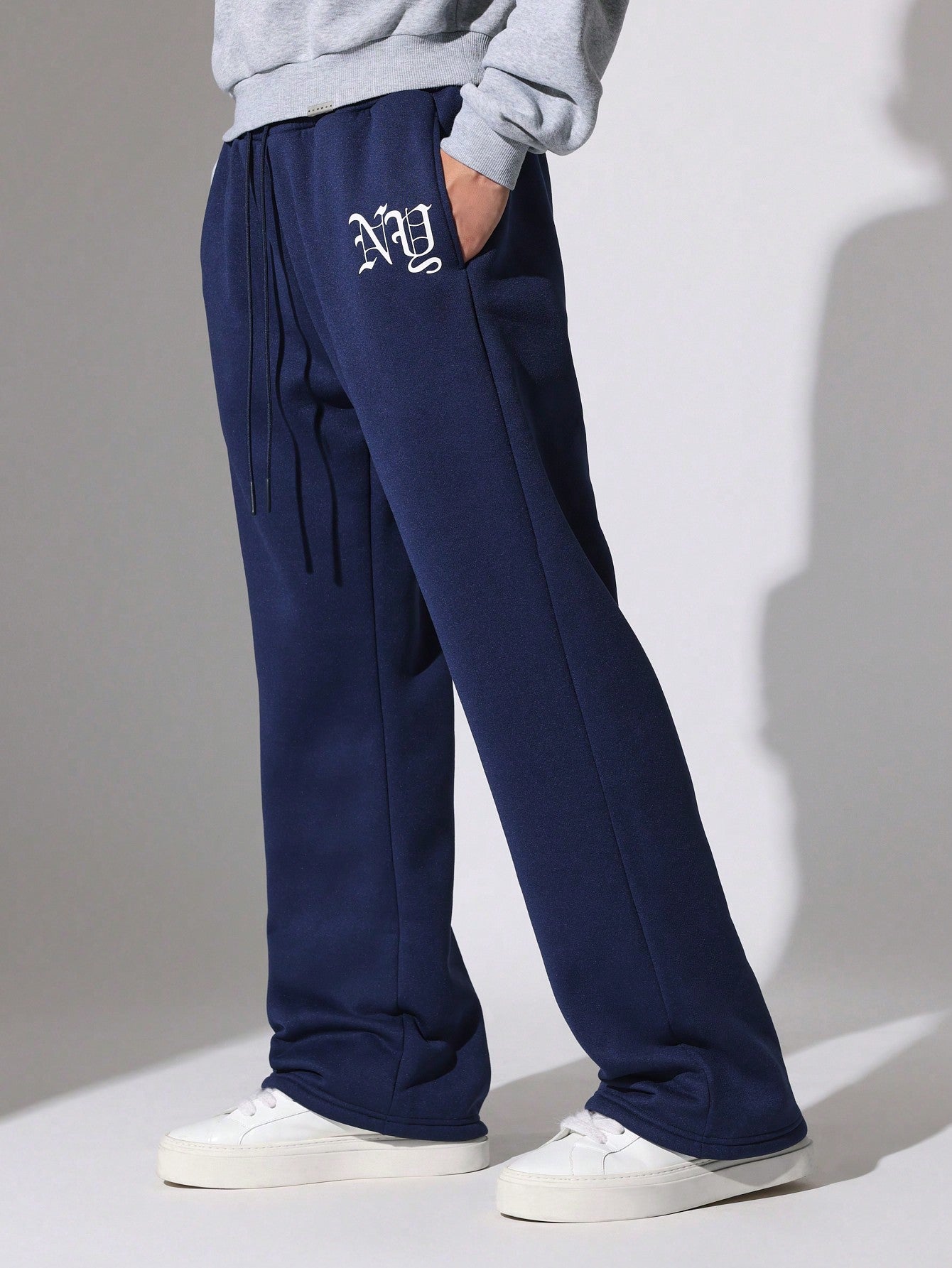 Flare Fit Sweatpants With Small Graphic Print