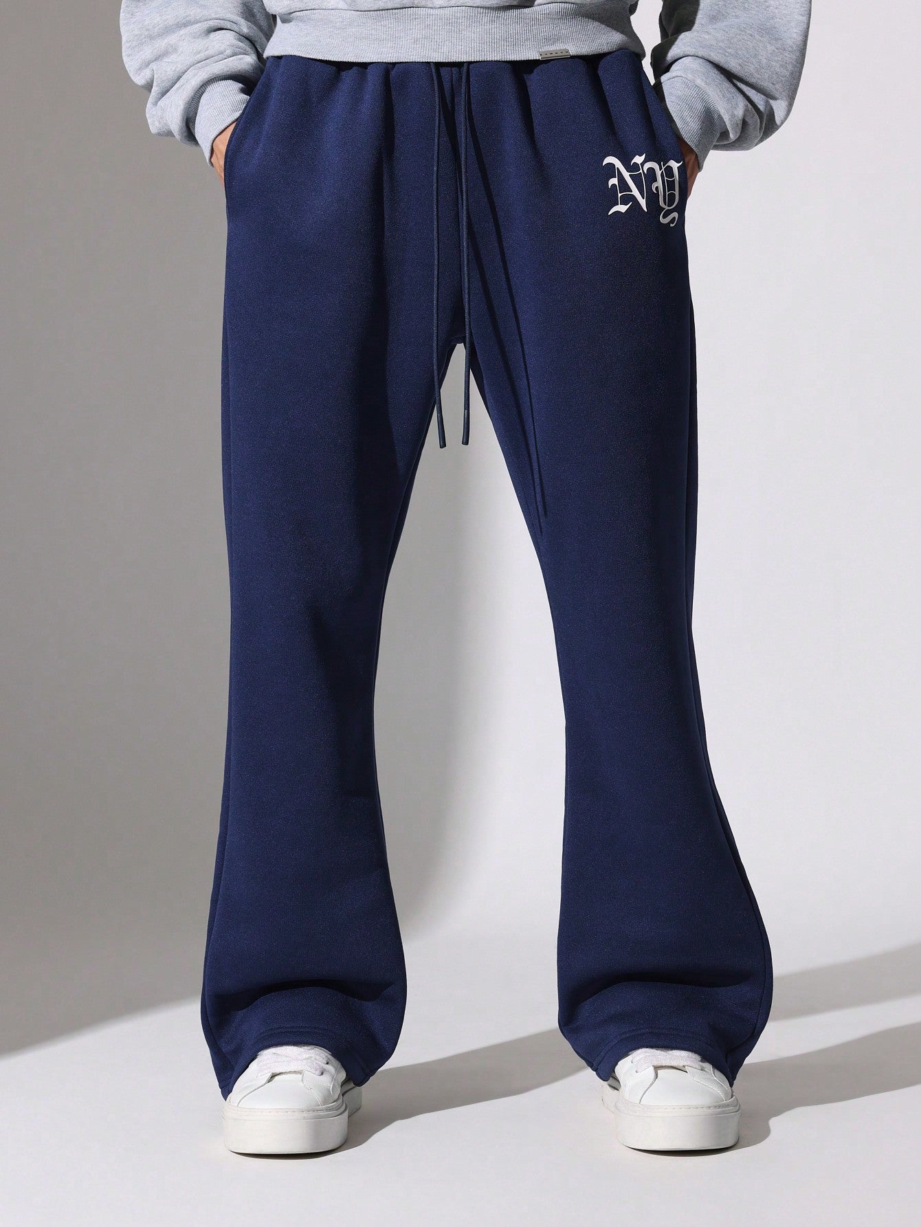 Flare Fit Sweatpants With Small Graphic Print