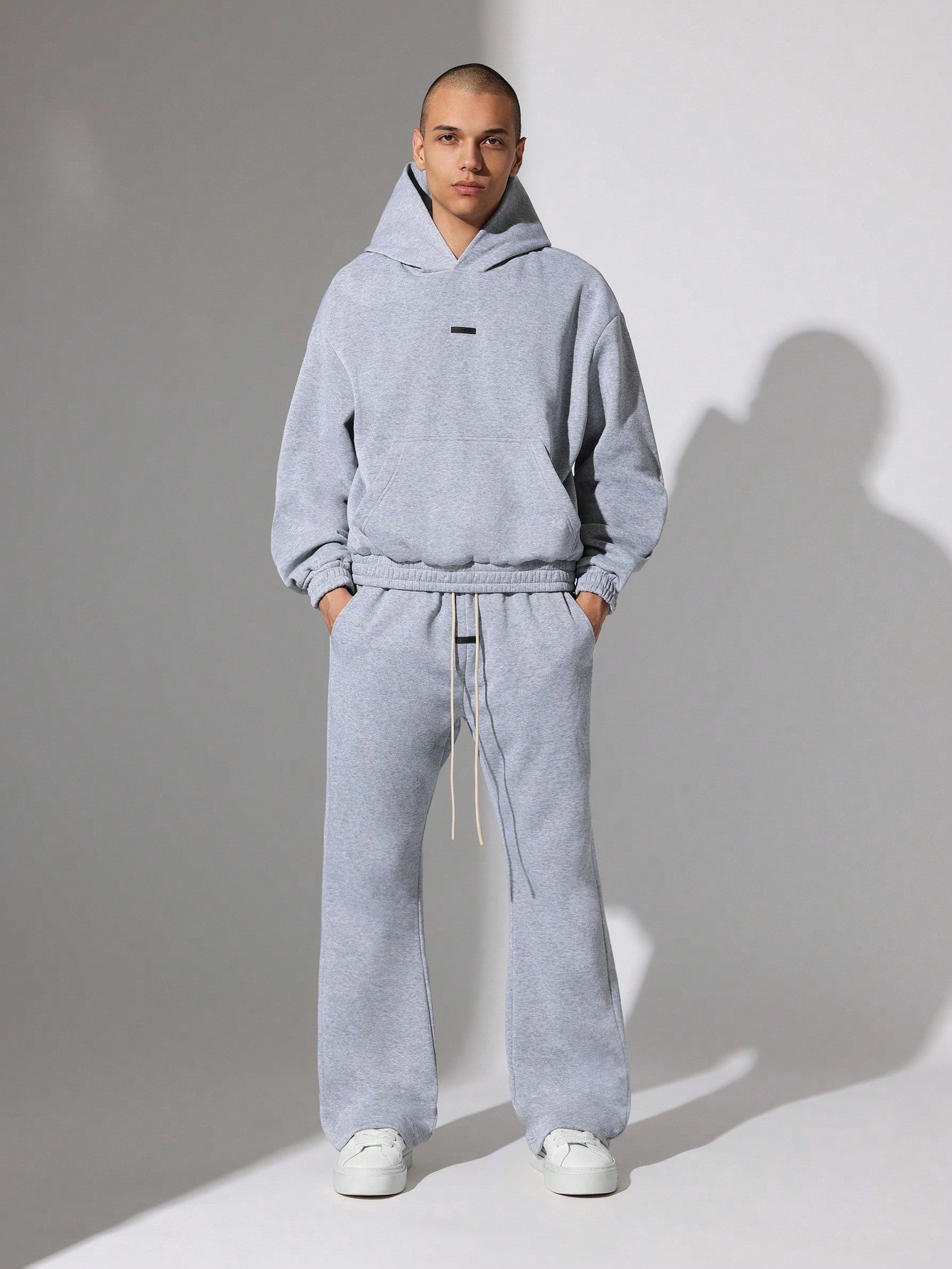 Regular Fit Overhead Hoodie And Flare Fit Sweatpants With Silicon Badge & Drawstrings 2 Piece Set