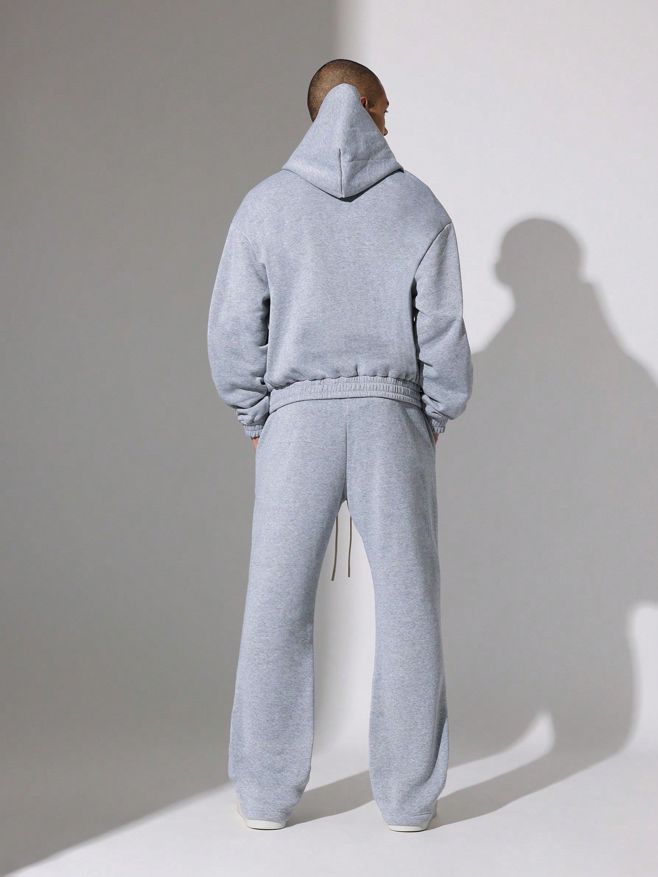 Regular Fit Overhead Hoodie And Flare Fit Sweatpants With Silicon Badge & Drawstrings 2 Piece Set