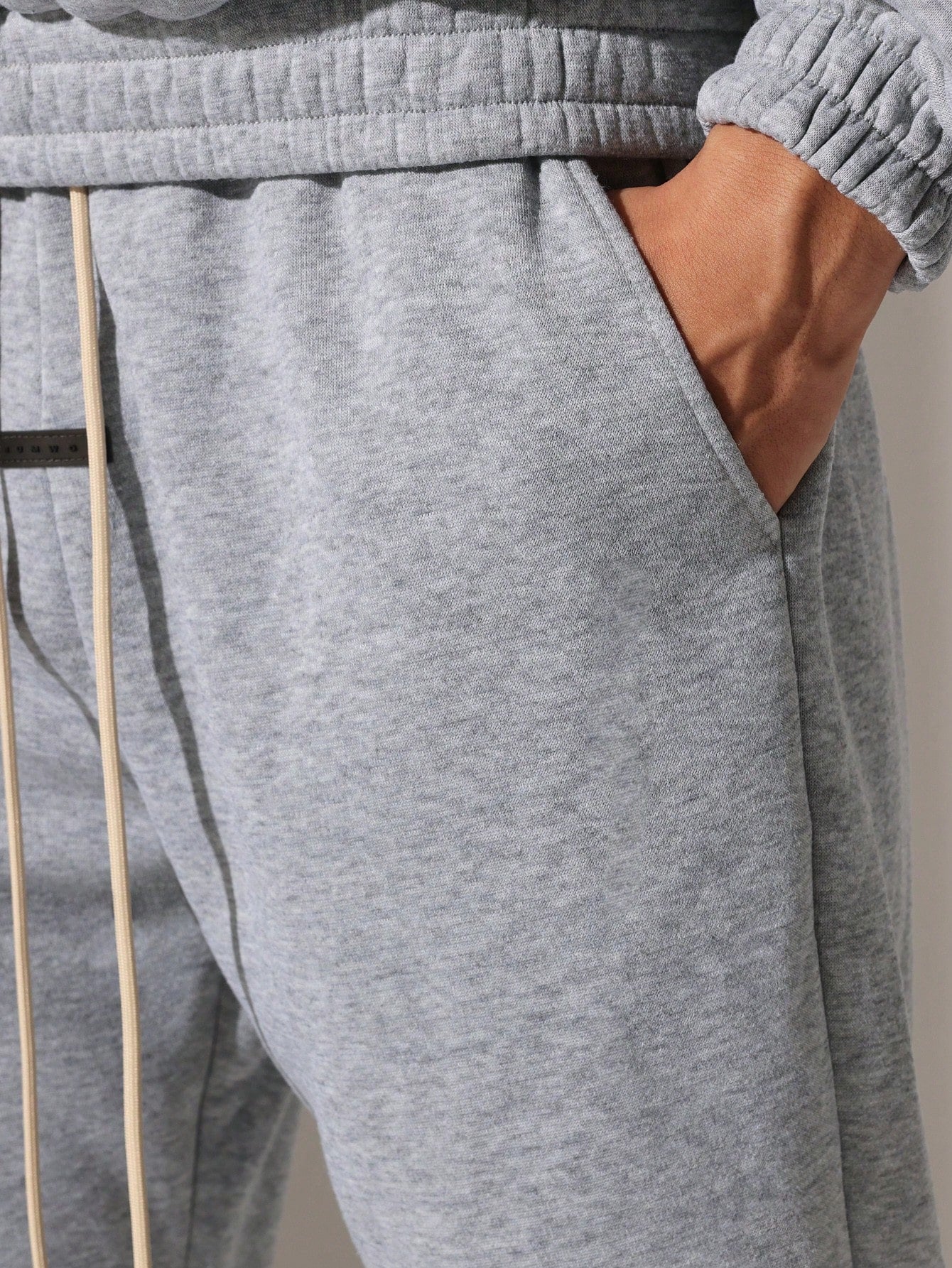 Regular Fit Overhead Hoodie And Flare Fit Sweatpants With Silicon Badge & Drawstrings 2 Piece Set