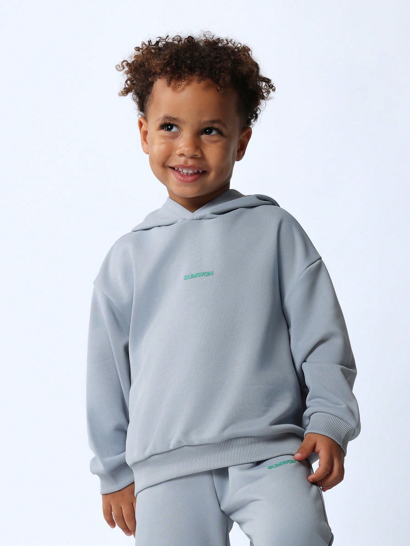 Young Boys Comfy Overhead Hoodie And Sweatpants With Small Graphic Print 2 Piece Set