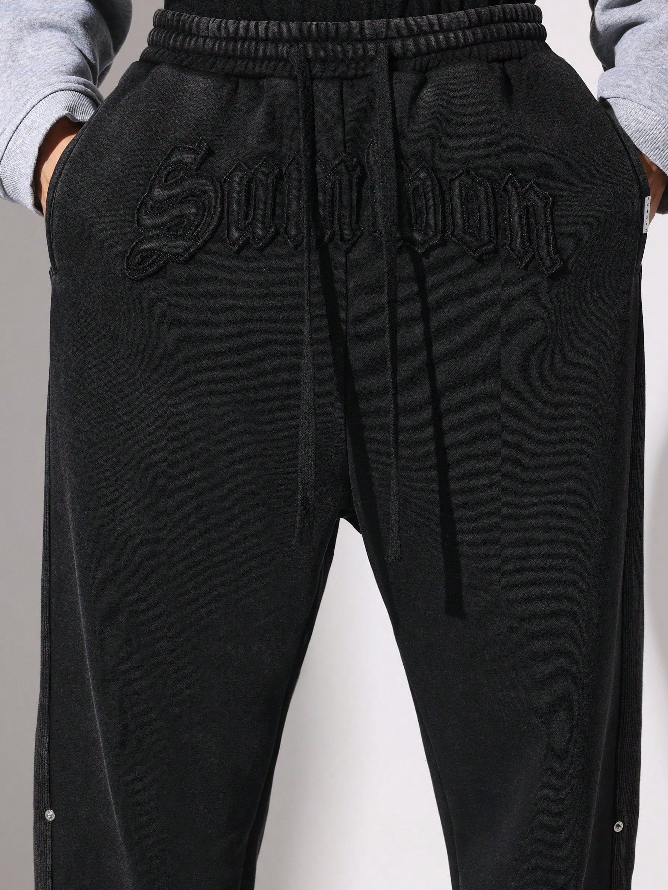 Washed Drop Crotch Sweatpants With Rivet Panel & Embroidered Applique