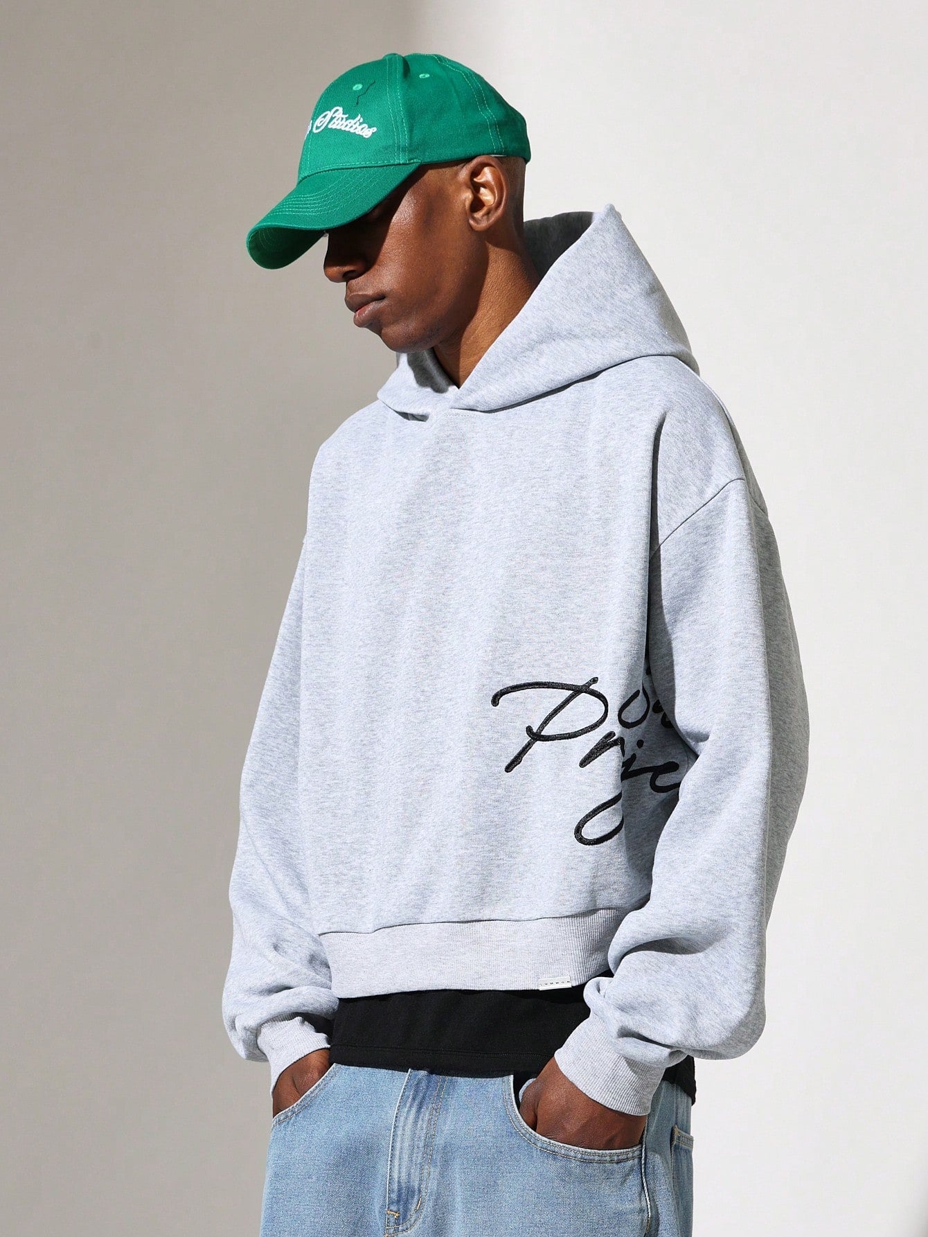 Crop Fit Overhead Hoodie With Script Embroidery Pattern