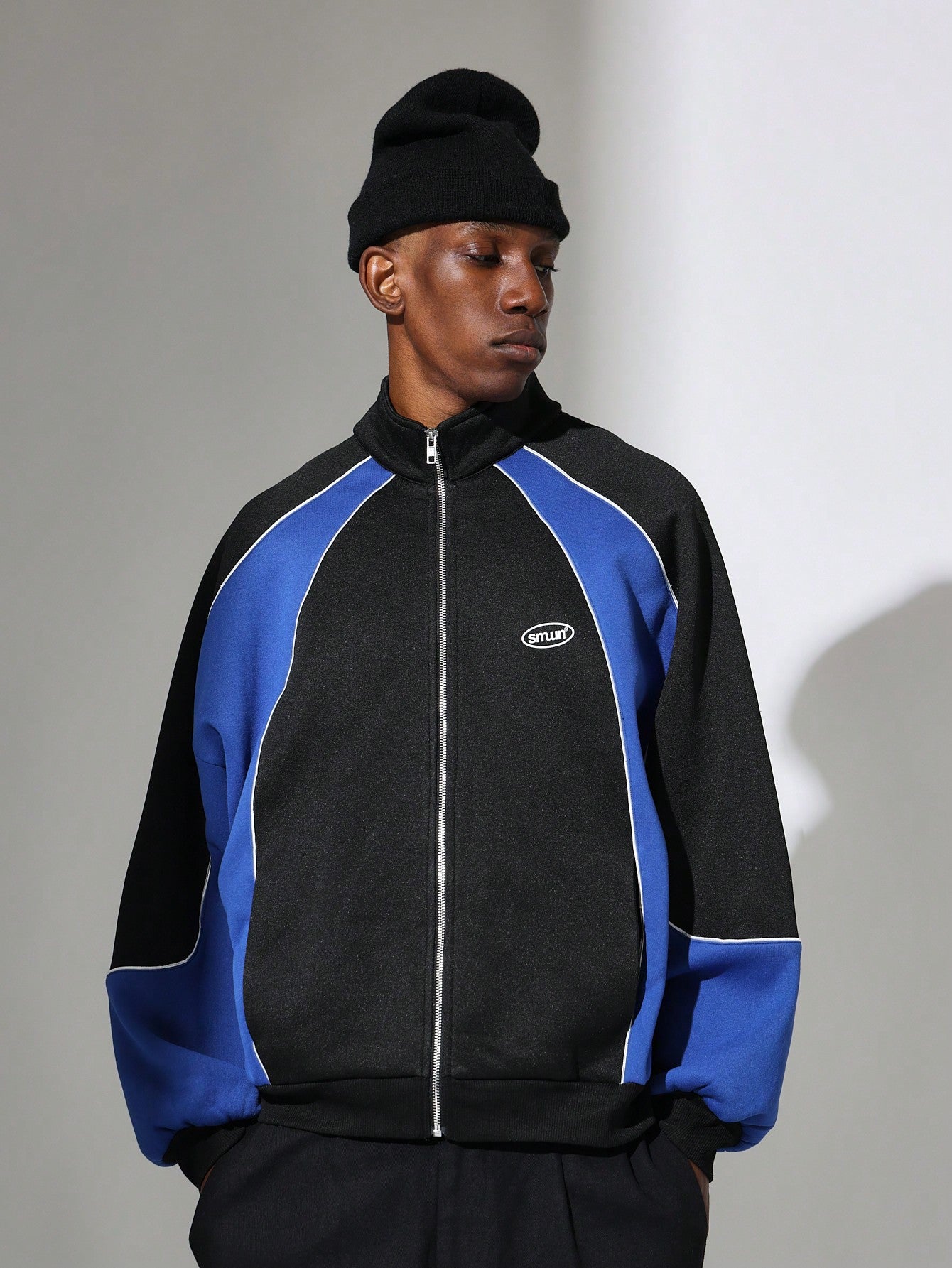 Regular Fit Zip Through Funnel Neck Blocked Jacket With Small Graphic Print & Piping Detail