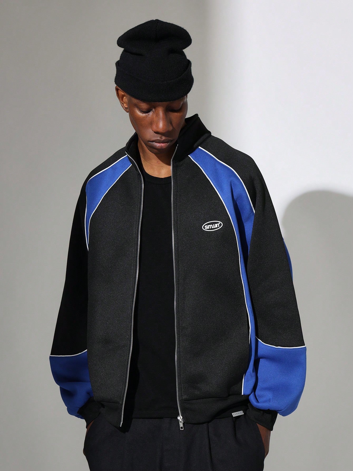 Regular Fit Zip Through Funnel Neck Blocked Jacket With Small Graphic Print & Piping Detail