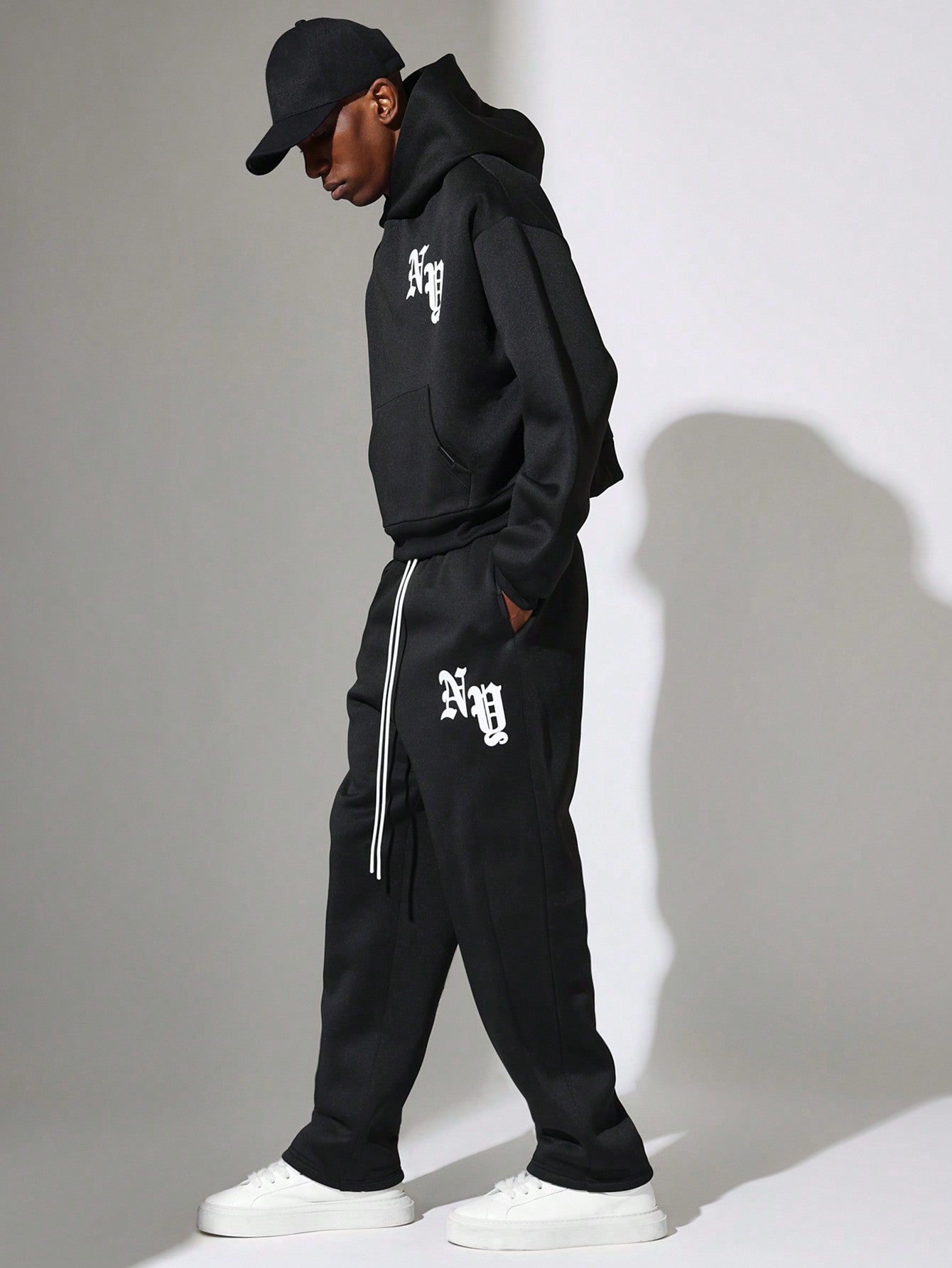 Crop Fit Overhead Hoodie And Straight Fit Drop Crotch Sweatpants With Small Graphic Print & Drawstrings 2 Piece Set