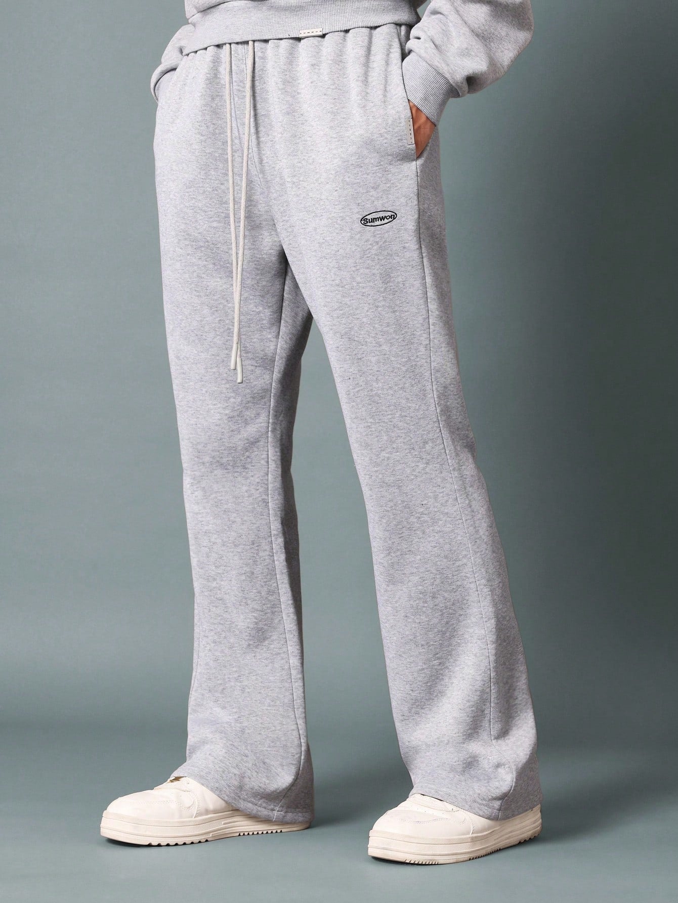 Flare Fit Sweatpants With Split Hem And Logo Embroidery