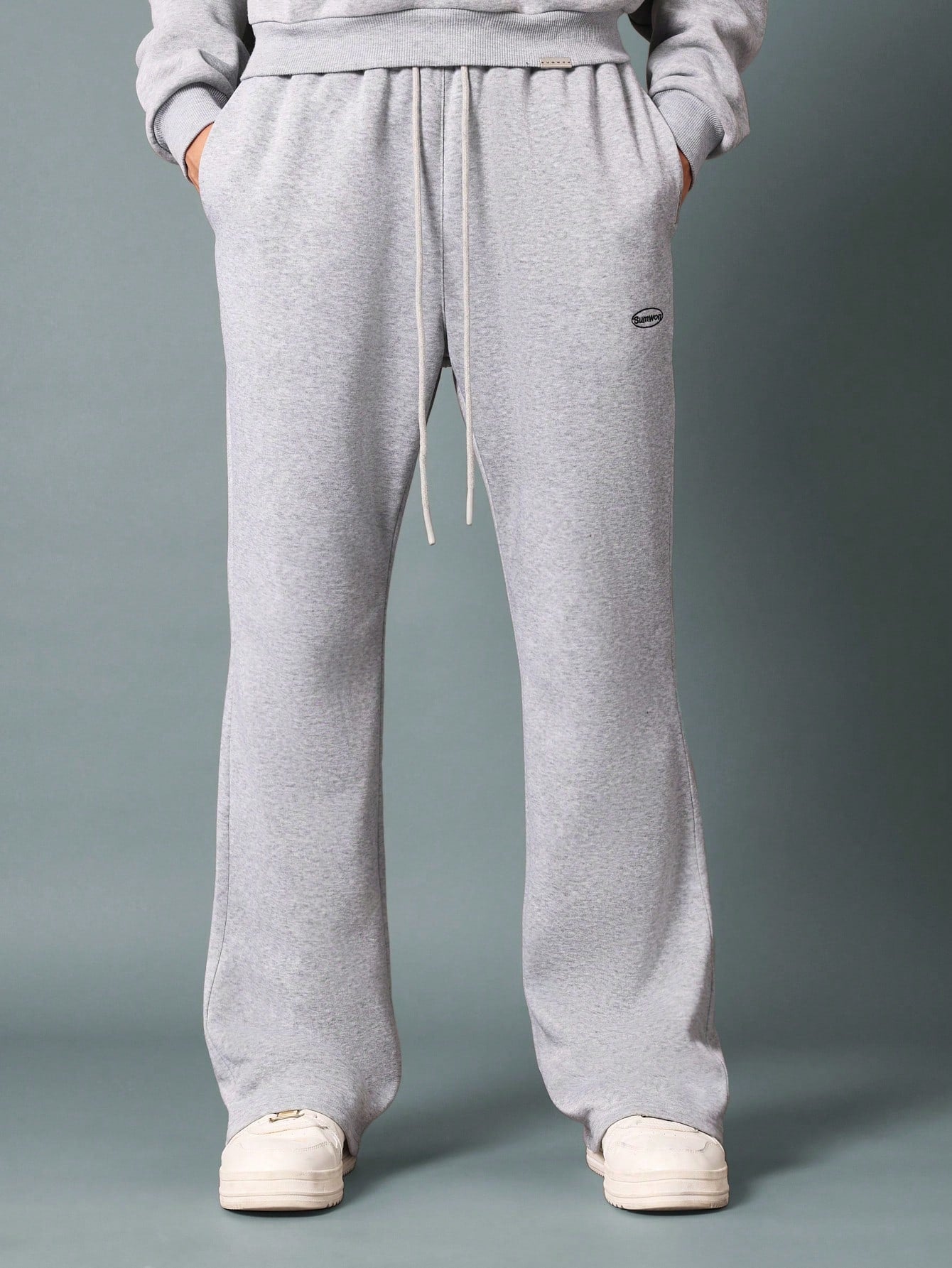 Flare Fit Sweatpants With Split Hem And Logo Embroidery