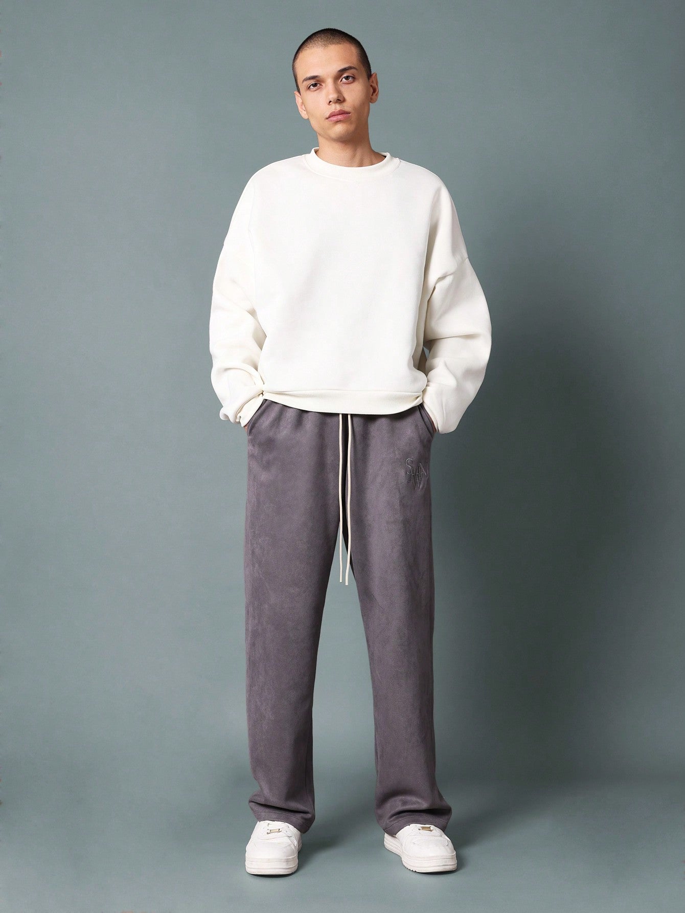 Skater Fit Suedette Sweatpants With Embroidery Patter & Drawstrings