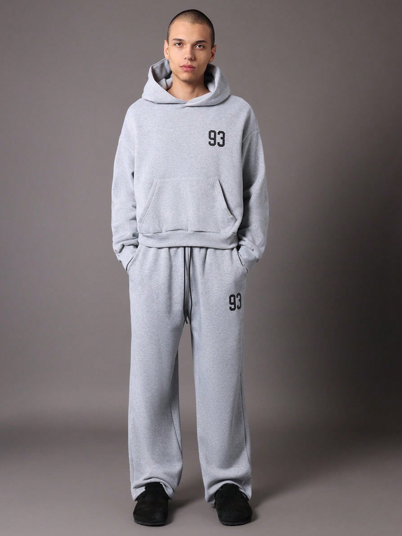 Crop Fit Overhead Hoodie And Straight Fit Drop Crotch Sweatpants With Small Graphic Print & Drawstrings 2 Piece Set