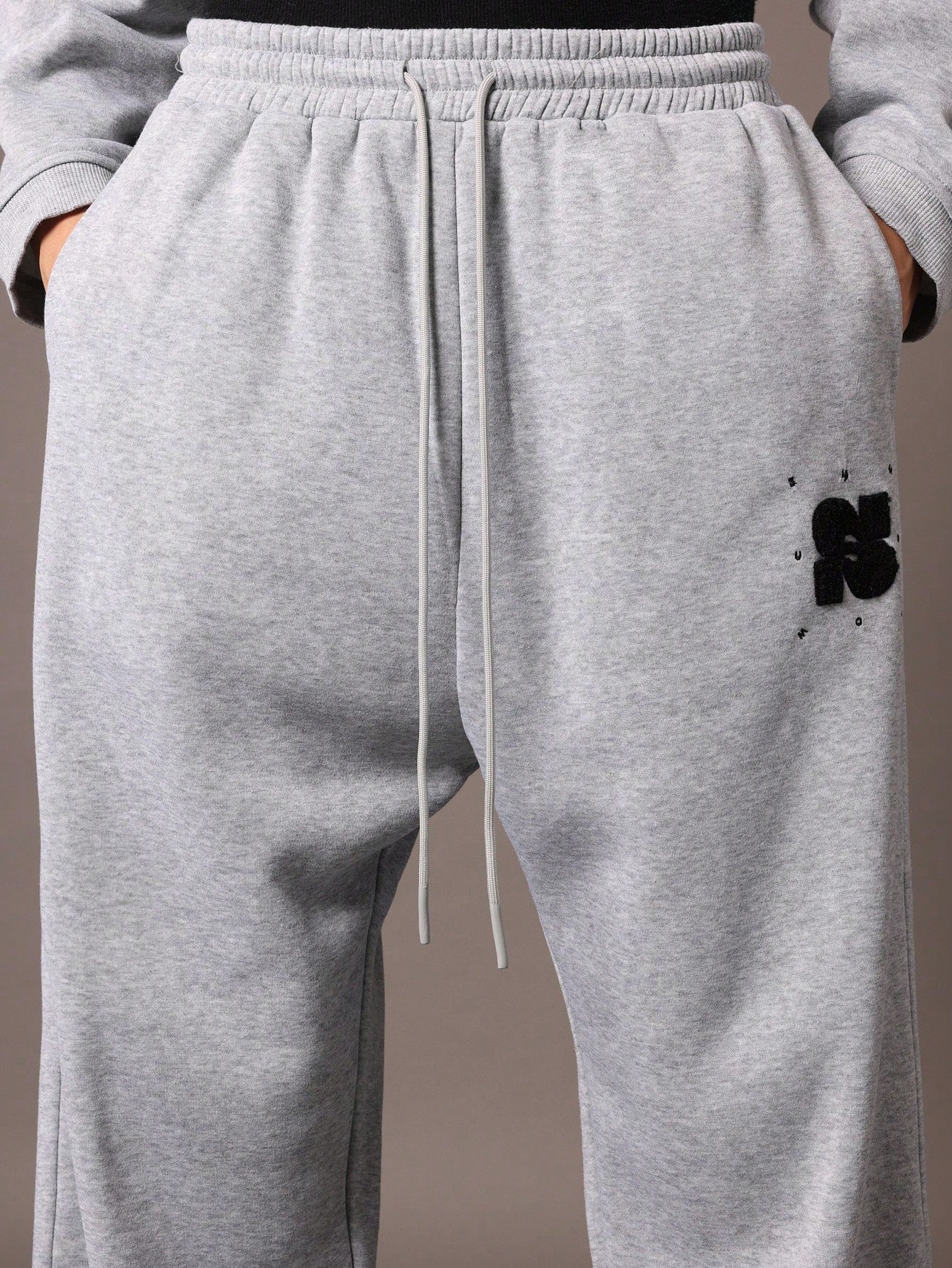 Drop Crotch Sweatpants With Drawstrings & Applique Embroidery Pattern