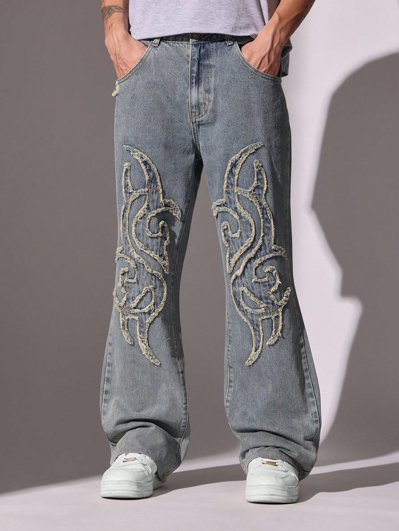 Loose Flare Fit Jean With Embroidered Self-Fabric Patches